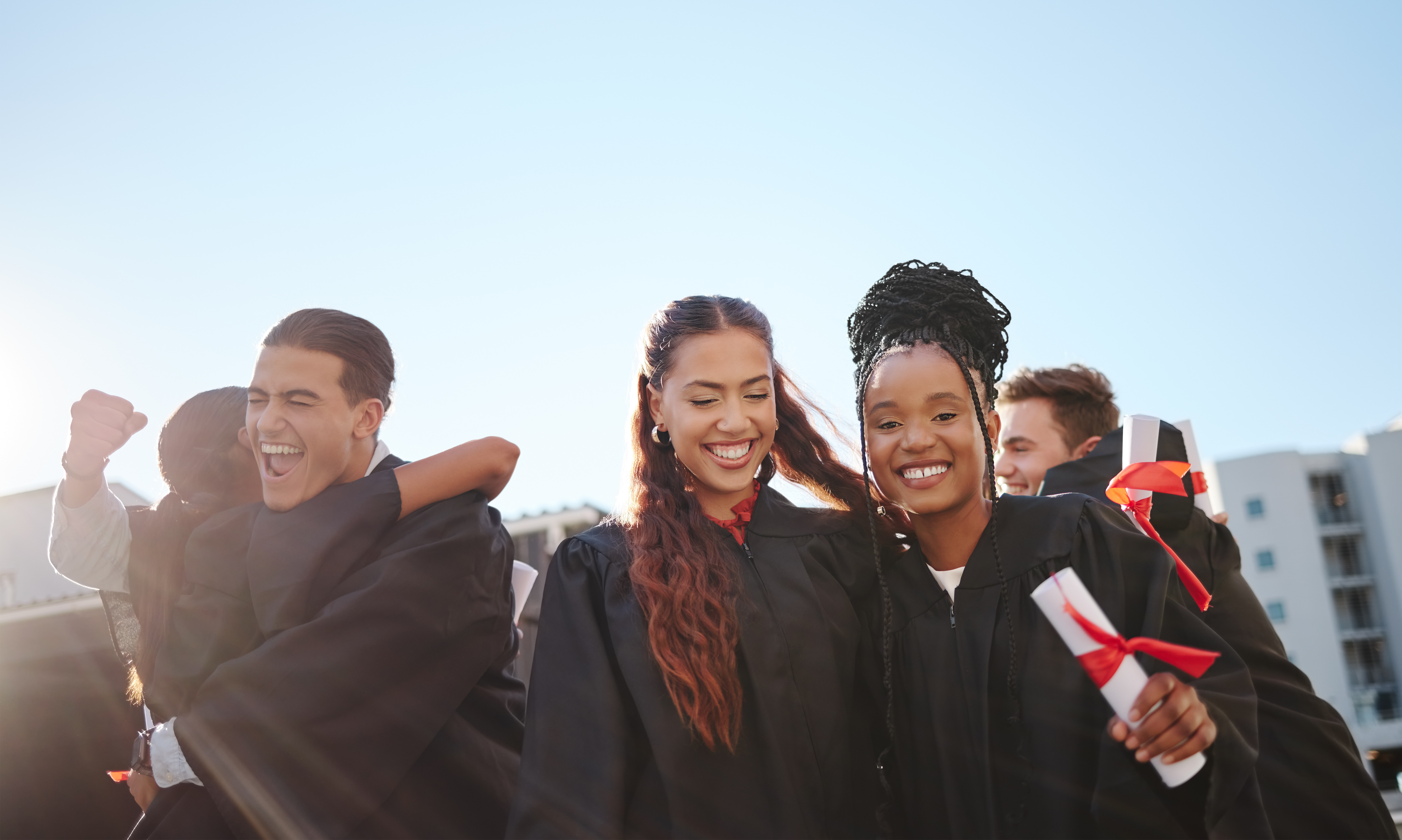 Graduates smiling