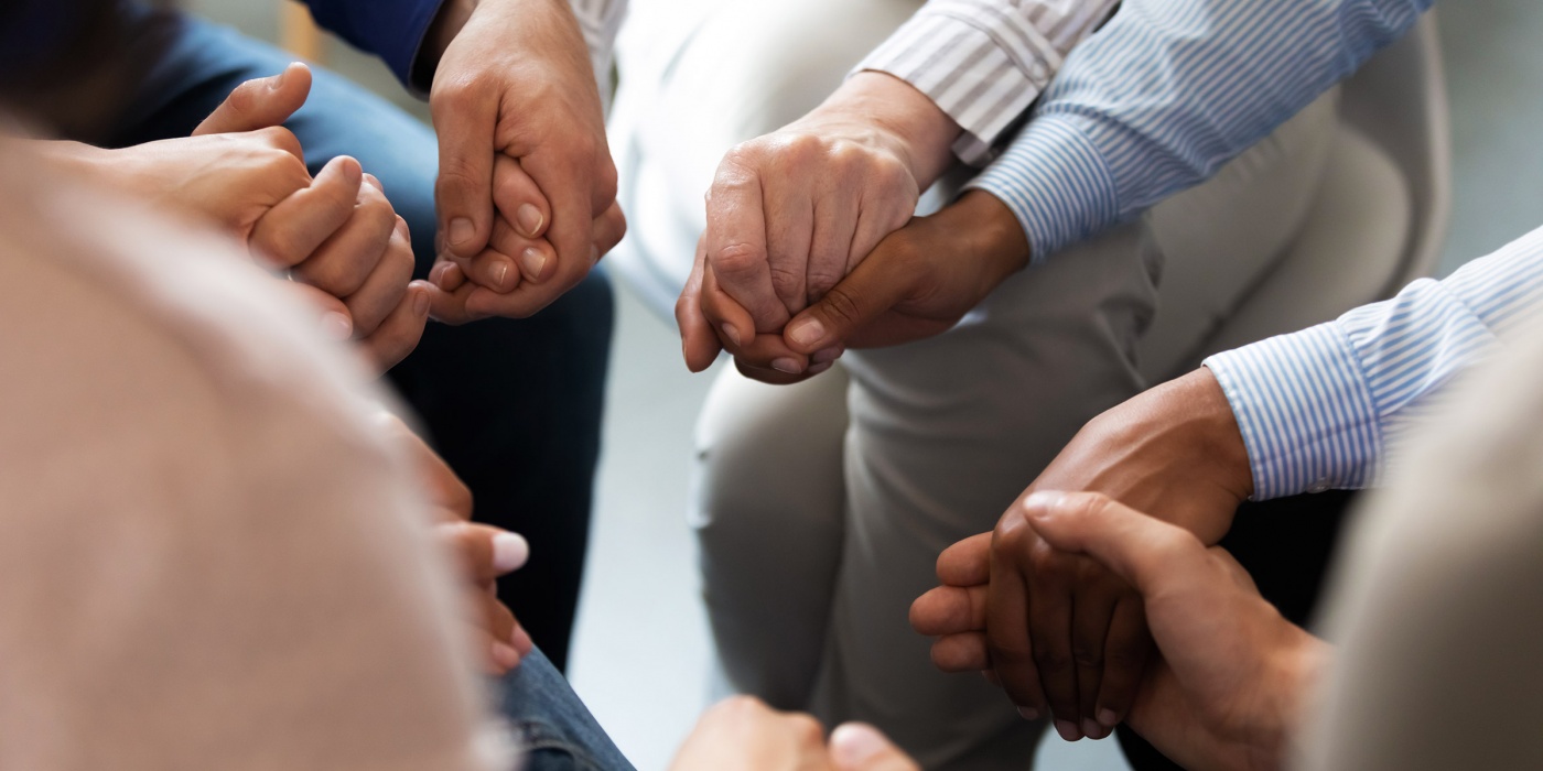 Holding Hands in healing circle