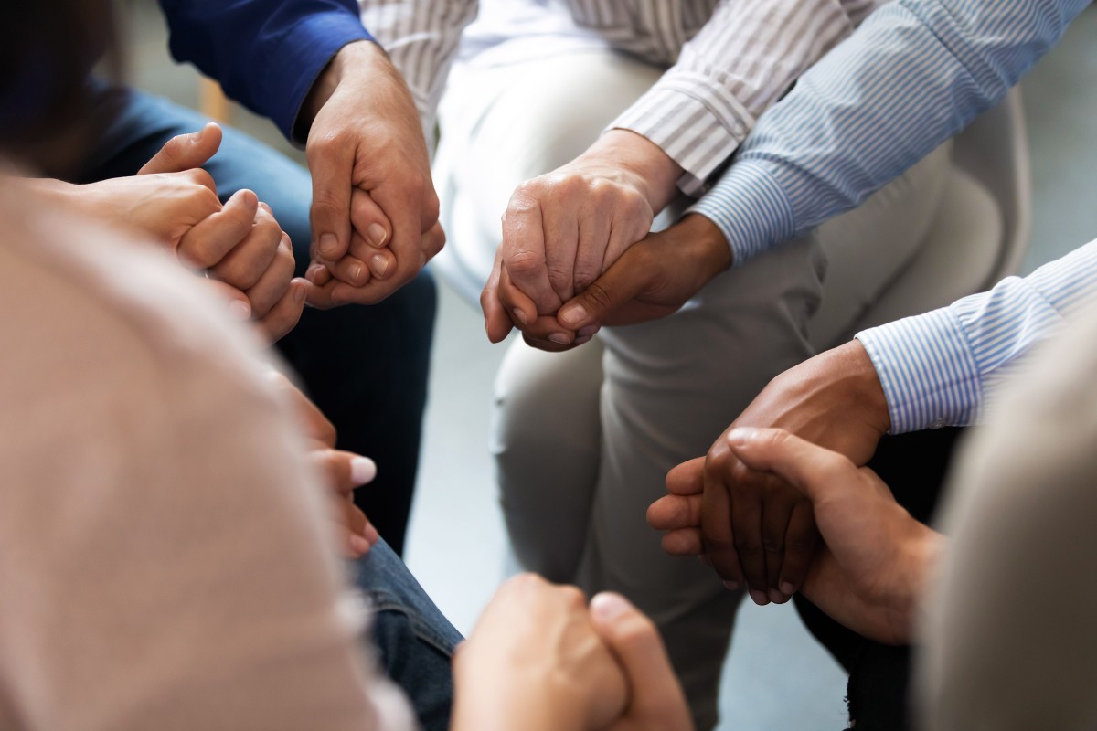 Holding Hands in healing circle